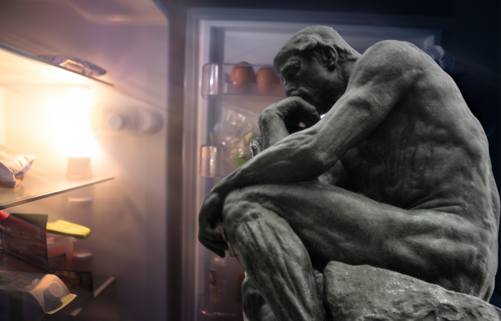 The Thinker looking in an open fridge